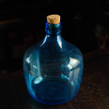 Small blue demijohn bottle