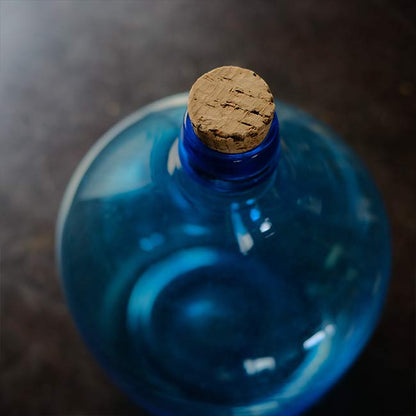 Small blue demijohn bottle