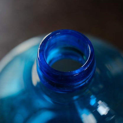 Small blue demijohn bottle