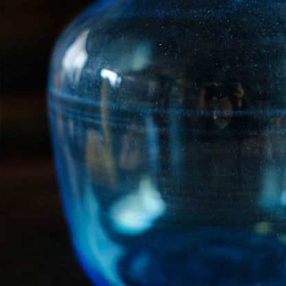 Small blue demijohn bottle