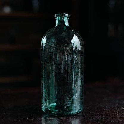 Aqua green medicine bottle