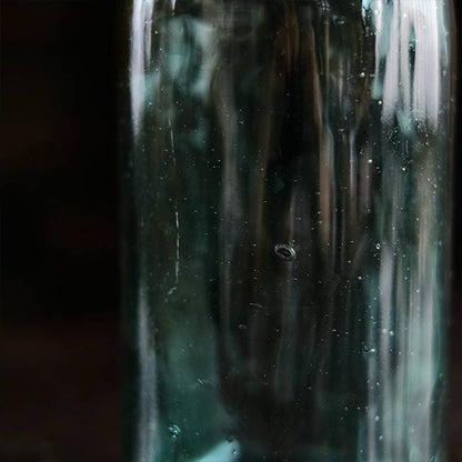 Aqua green medicine bottle