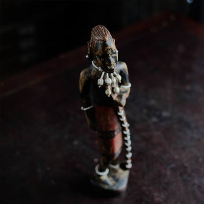 Wooden carving of a Masai woman
