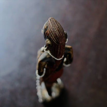 Wooden carving of a Masai woman
