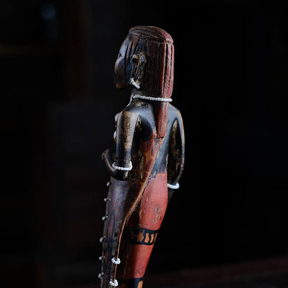 Wooden carving of a Masai woman