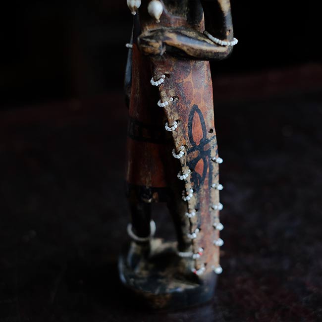 Wooden carving of a Masai woman