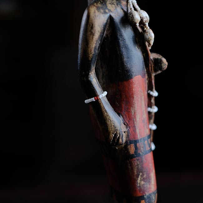 Wooden carving of a Masai woman