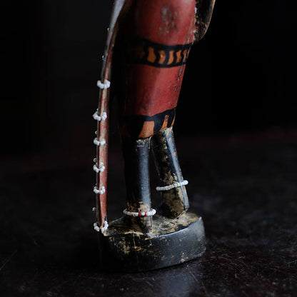 Wooden carving of a Masai woman