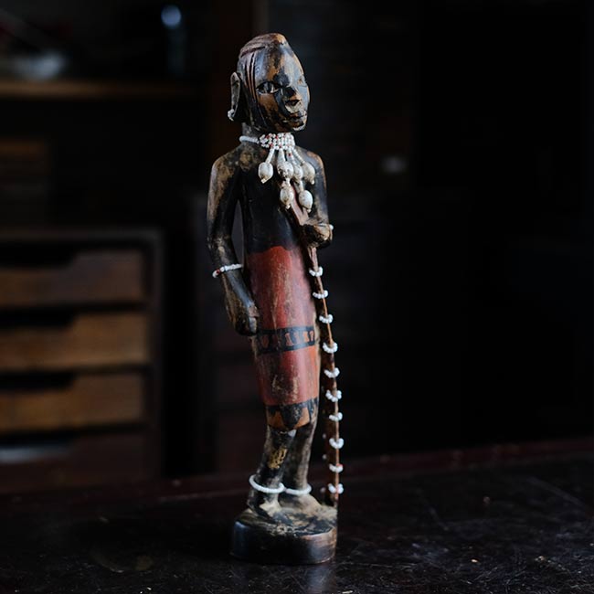 Wooden carving of a Masai woman