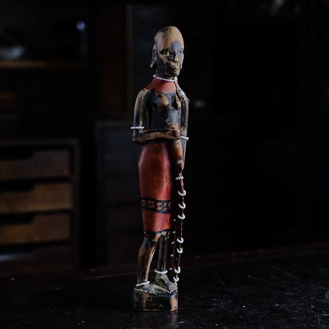 Wooden carving of a Masai woman