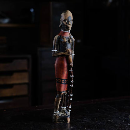 Wooden carving of a Masai woman