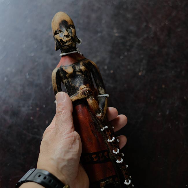 Wooden carving of a Masai woman