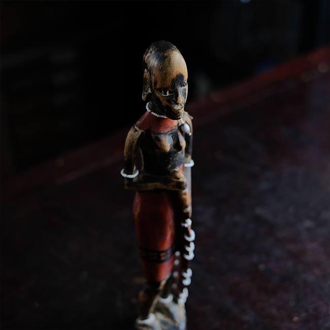 Wooden carving of a Masai woman