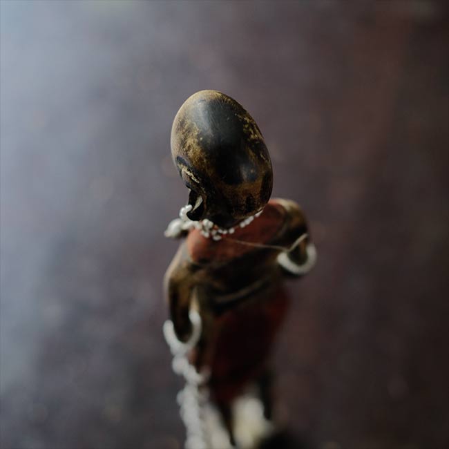 Wooden carving of a Masai woman