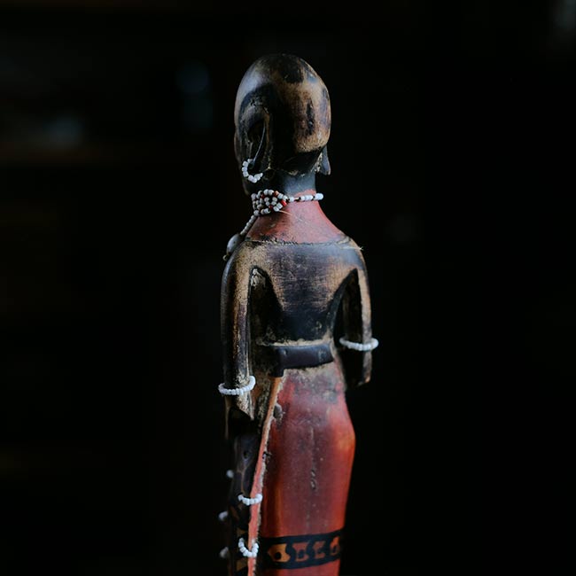 Wooden carving of a Masai woman