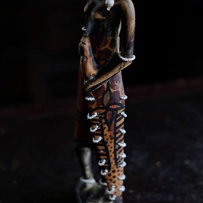 Wooden carving of a Masai woman