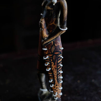 Wooden carving of a Masai woman