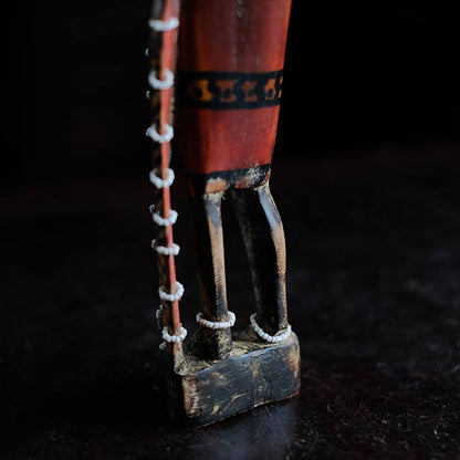Wooden carving of a Masai woman
