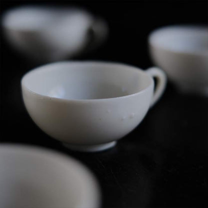 Small white porcelain cup