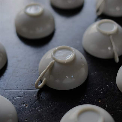 Small white porcelain cup