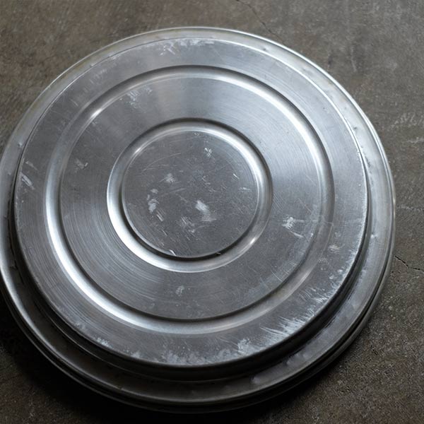 Aluminum stool with wastebasket