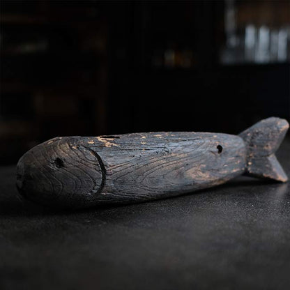自在鉤の横木の魚