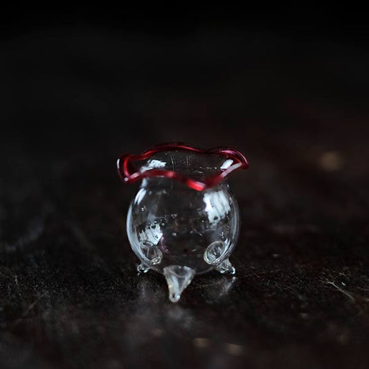 tiny goldfish bowl