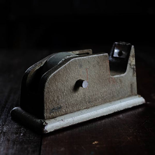 Iron tape dispenser