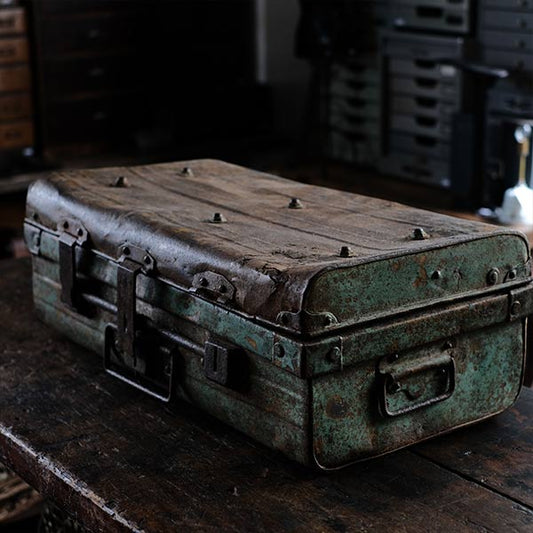 A rusty green trunk