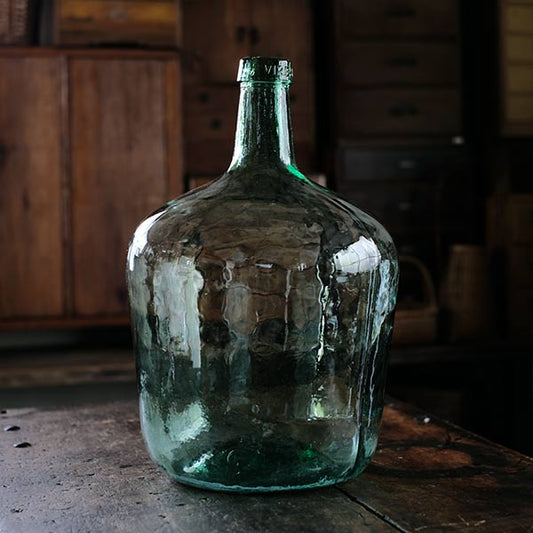 Small sea green demijohn bottle