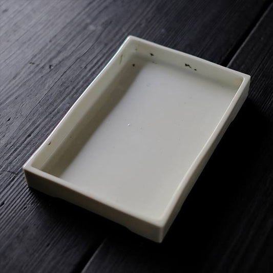 White porcelain water basin